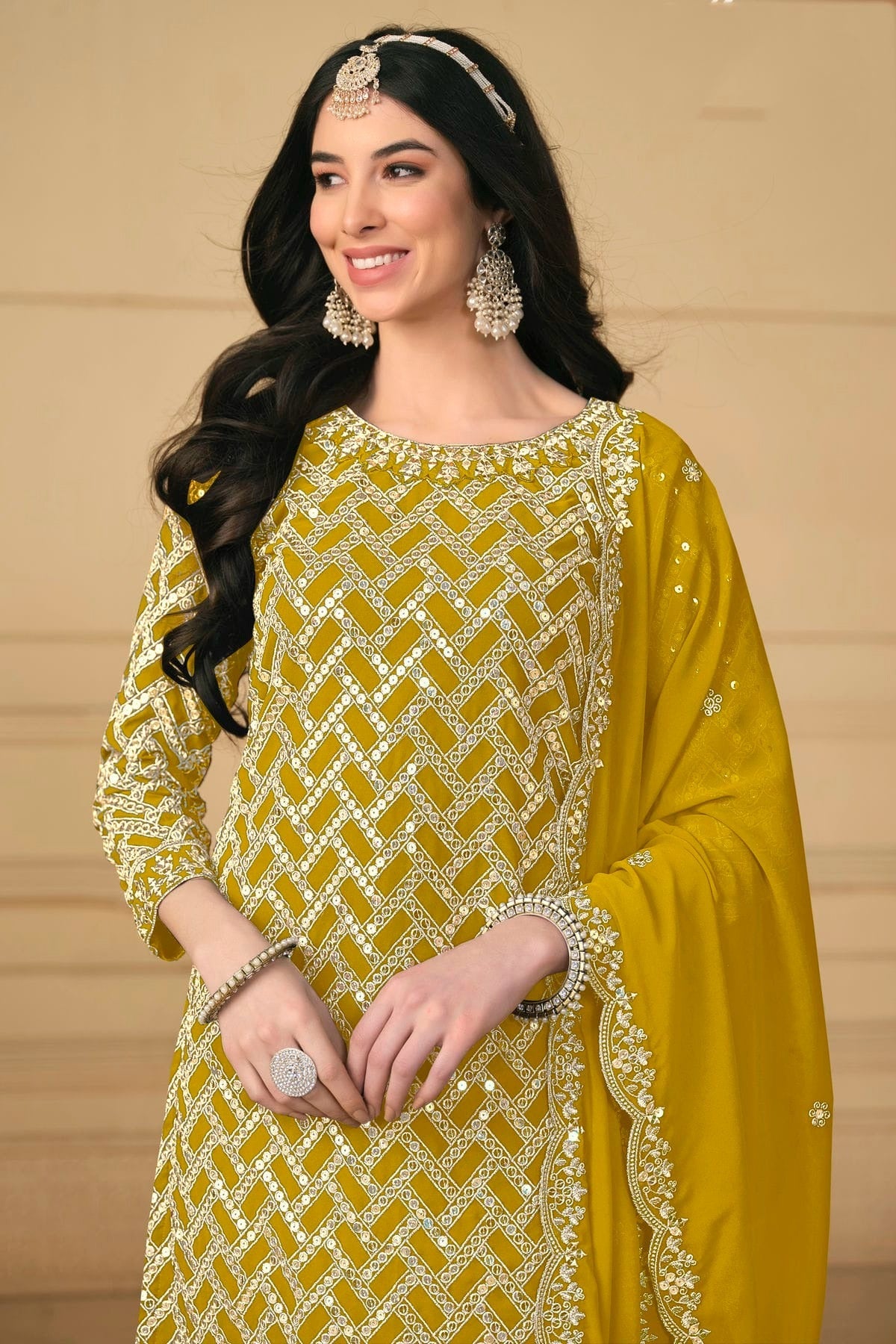 Mustard Colour Semi Stitched Faux Georgette Sharara Suit SM1050473 A