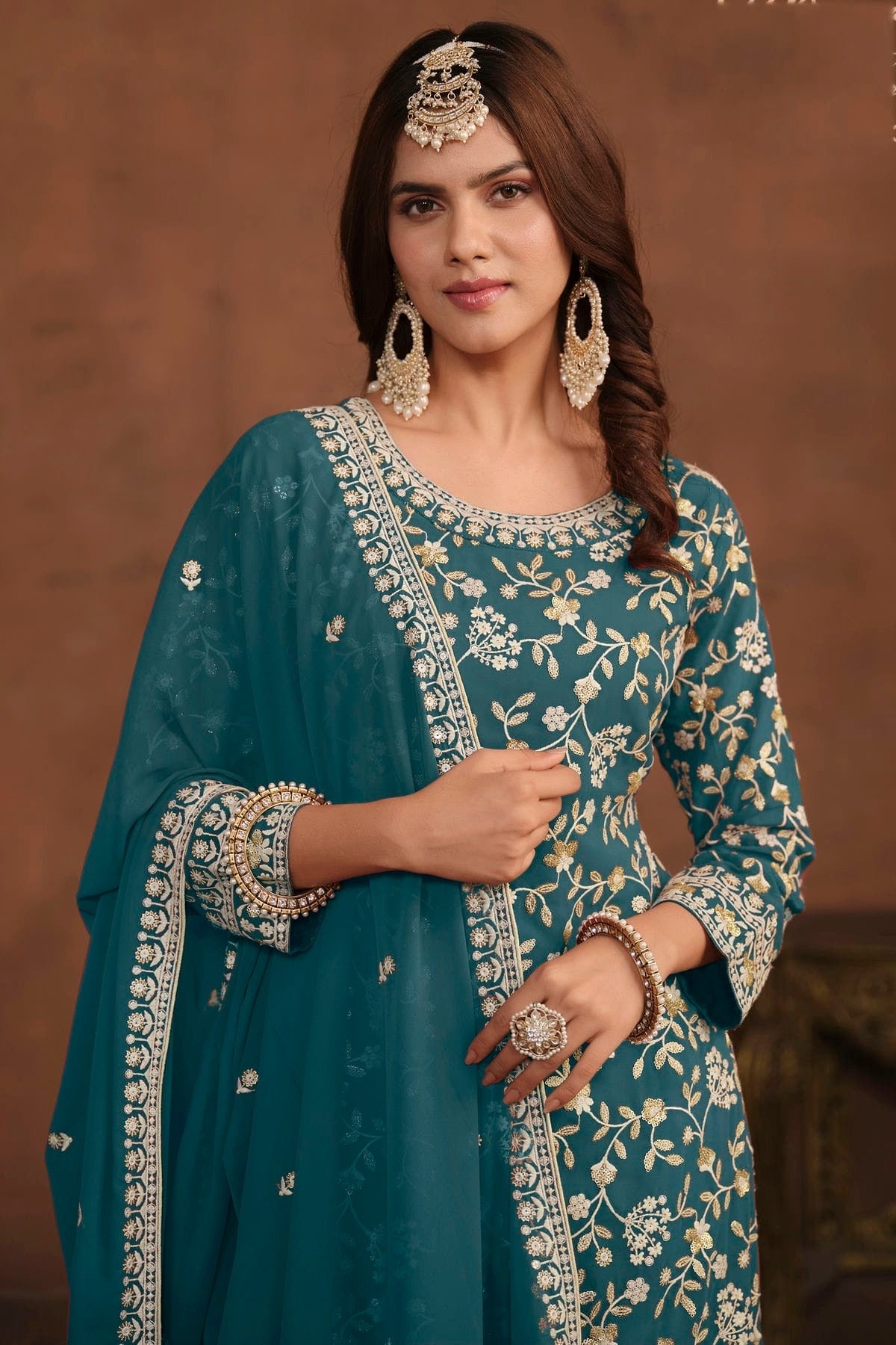 Teal Colour Semi Stitched Faux Georgette Sharara Suit SM1050467 A
