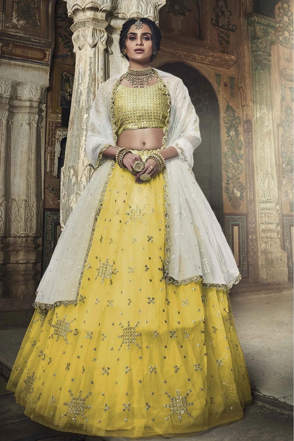 Yellow Colour Soft Net Sequins Work Lehenga Choli LC1080617