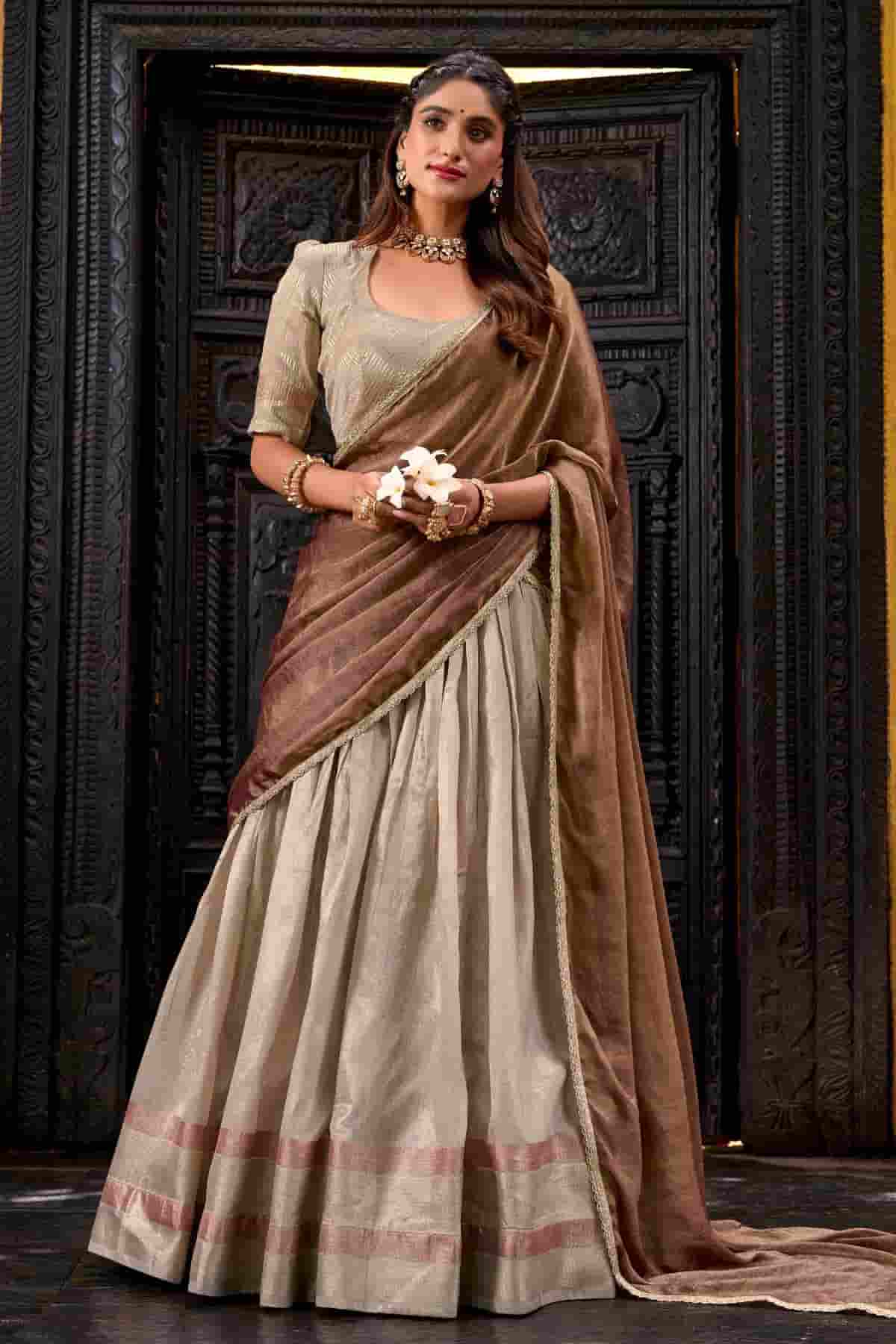 Dhupion Silk Stitched Lehenga Choli In Cream Colour