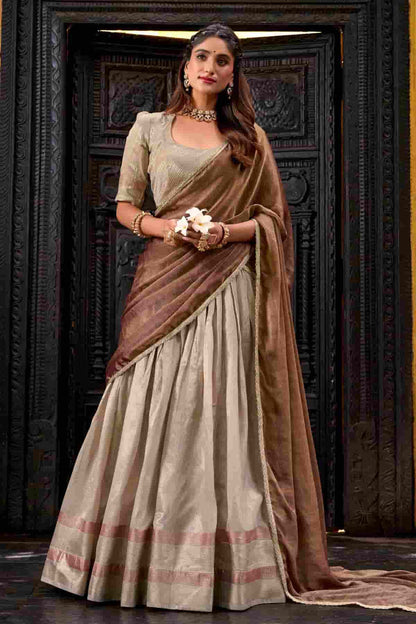 Dhupion Silk Stitched Lehenga Choli In Cream Colour
