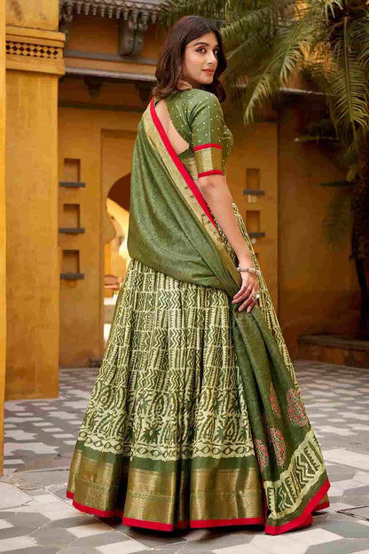 Dola Silk Batik Print Stitched Lehenga Choli In Mehendi Green Colour