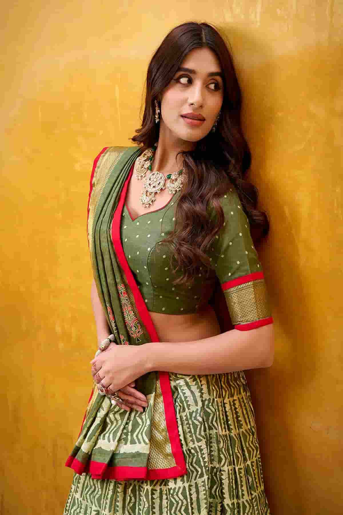 Dola Silk Batik Print Stitched Lehenga Choli In Mehendi Green Colour