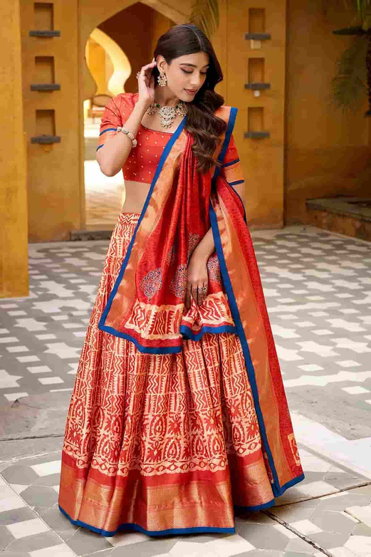 Dola Silk Batik Print Stitched Lehenga Choli In Orange Colour