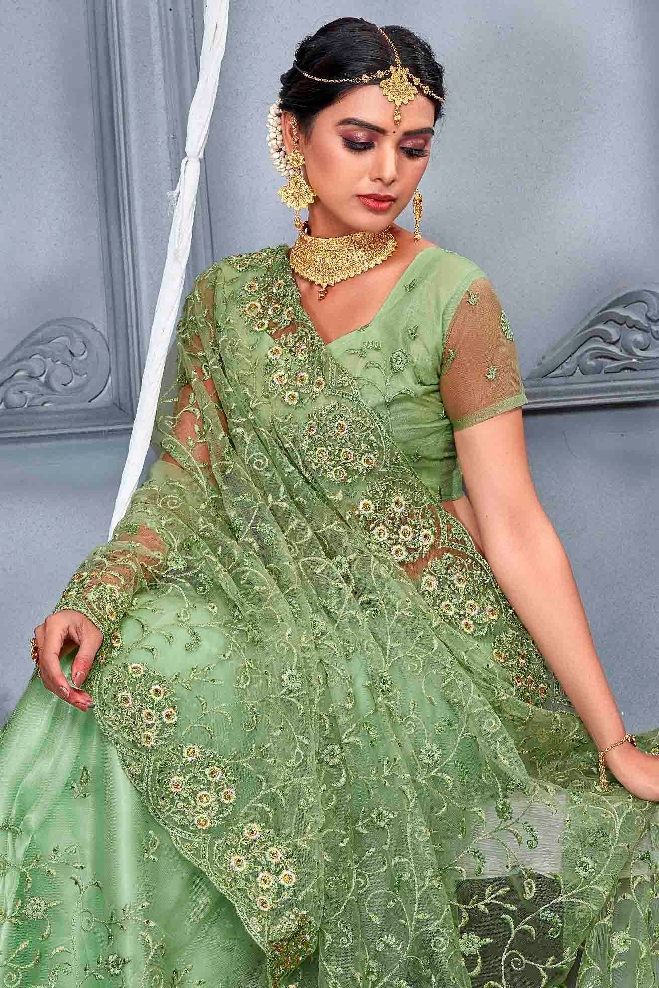 Dusty Pista Green Colour Net Designer Saree SD1090492 A
