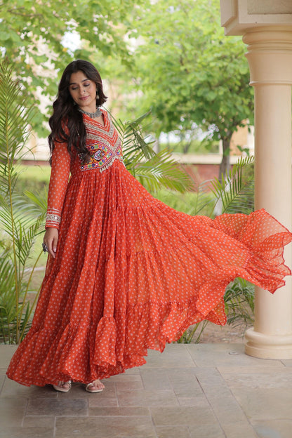 Faux Georgette Printed Stitched Gown In Rust Colour