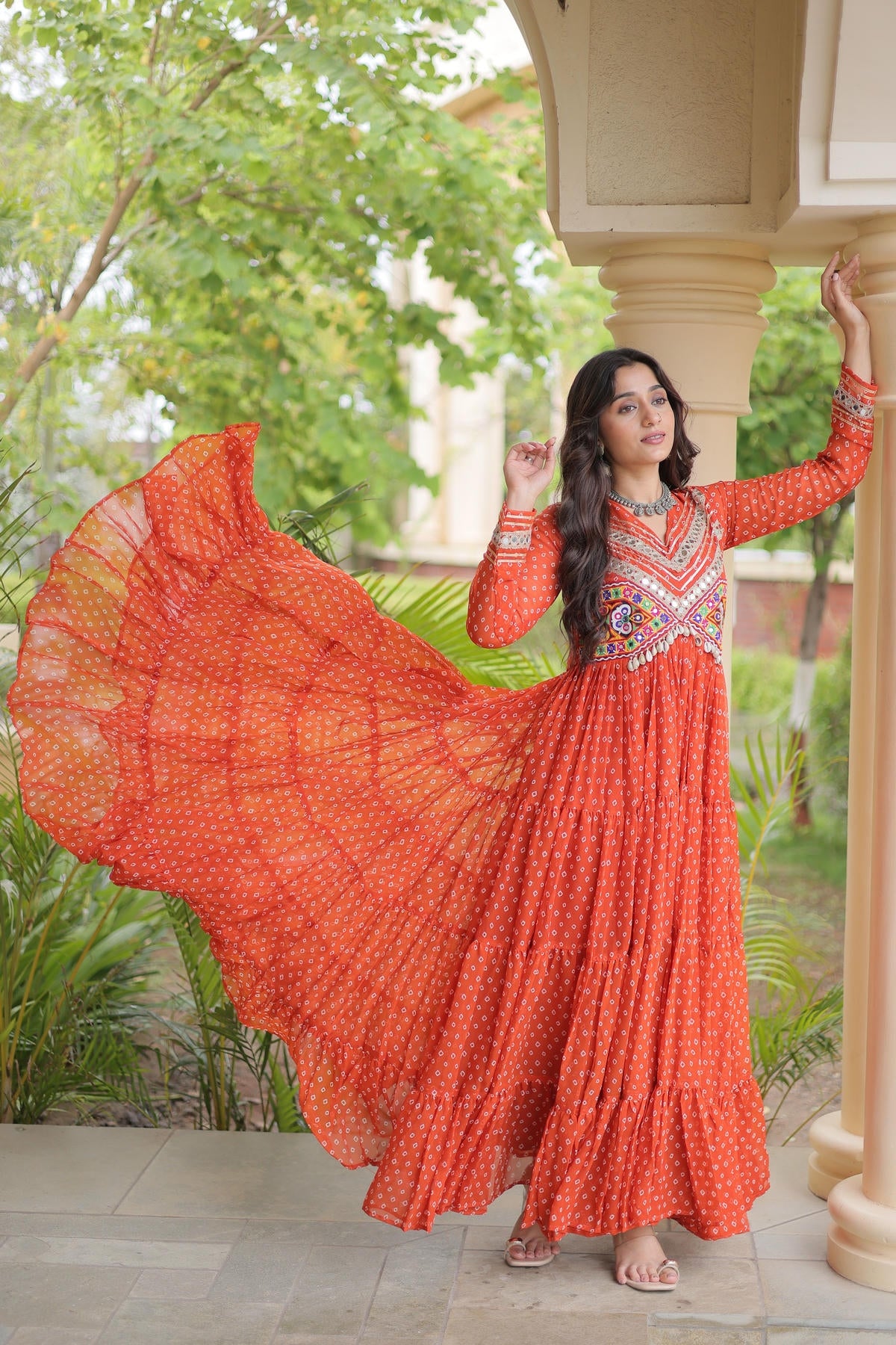 Faux Georgette Printed Stitched Gown In Rust Colour