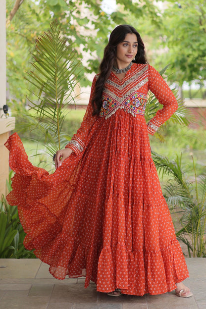 Faux Georgette Printed Stitched Gown In Rust Colour