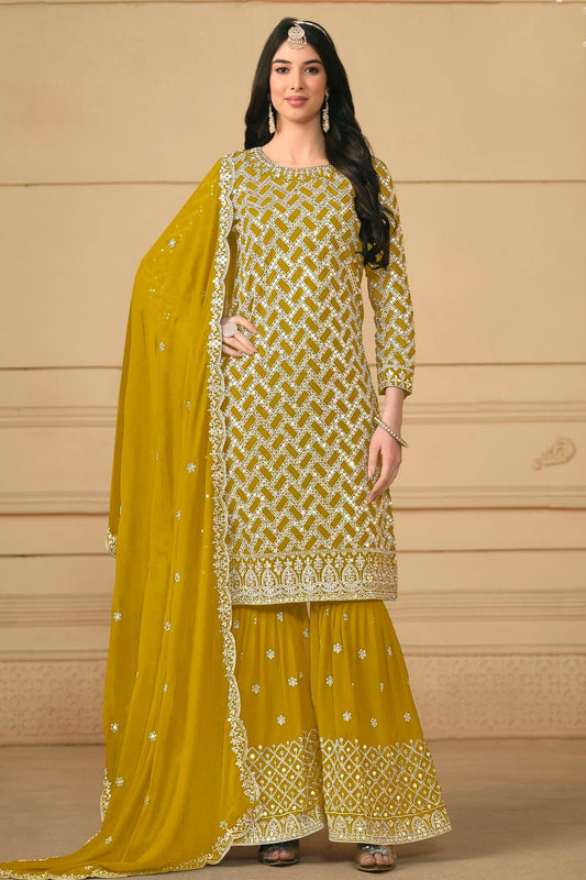 Mustard Colour Semi Stitched Faux Georgette Sharara Suit SM1050473