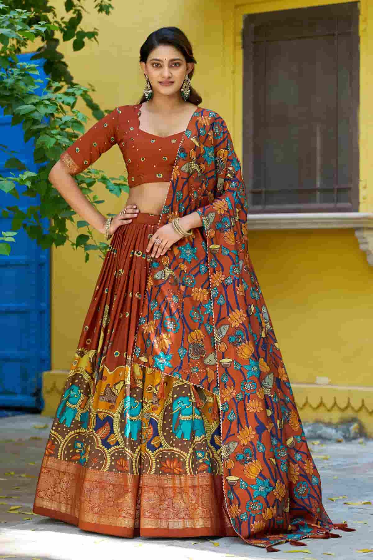 Tasar Silk Kalamkari Print Foil Work Lehenga Choli In Red Colour
