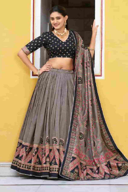 Tasar Silk Zari Woven Work Lehenga Choli In Black Colour