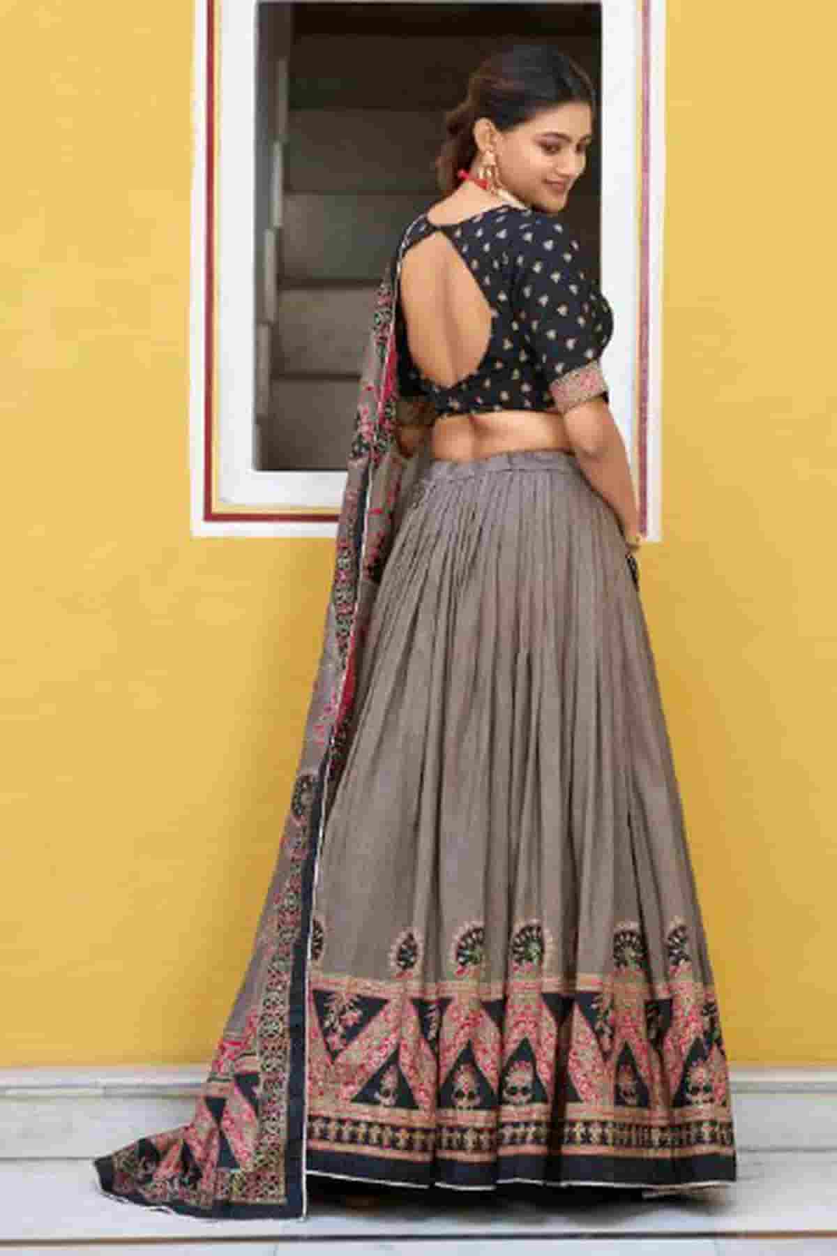 Tasar Silk Zari Woven Work Lehenga Choli In Black Colour
