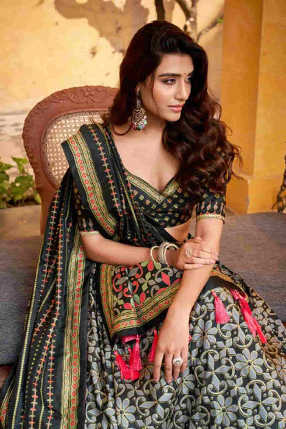 Tasar Silk Zari Woven Work Lehenga Choli In Black Colour