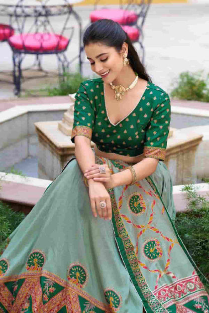 Tasar Silk Zari Woven Work Lehenga Choli In Green Colour