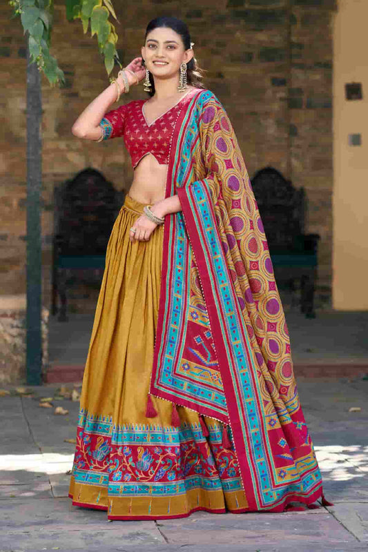 Tasar Silk Zari Woven Work Lehenga Choli In Mustard Brown Colour