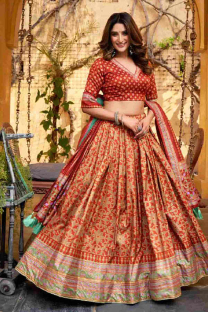 Tasar Silk Zari Woven Work Lehenga Choli In Orange Colour