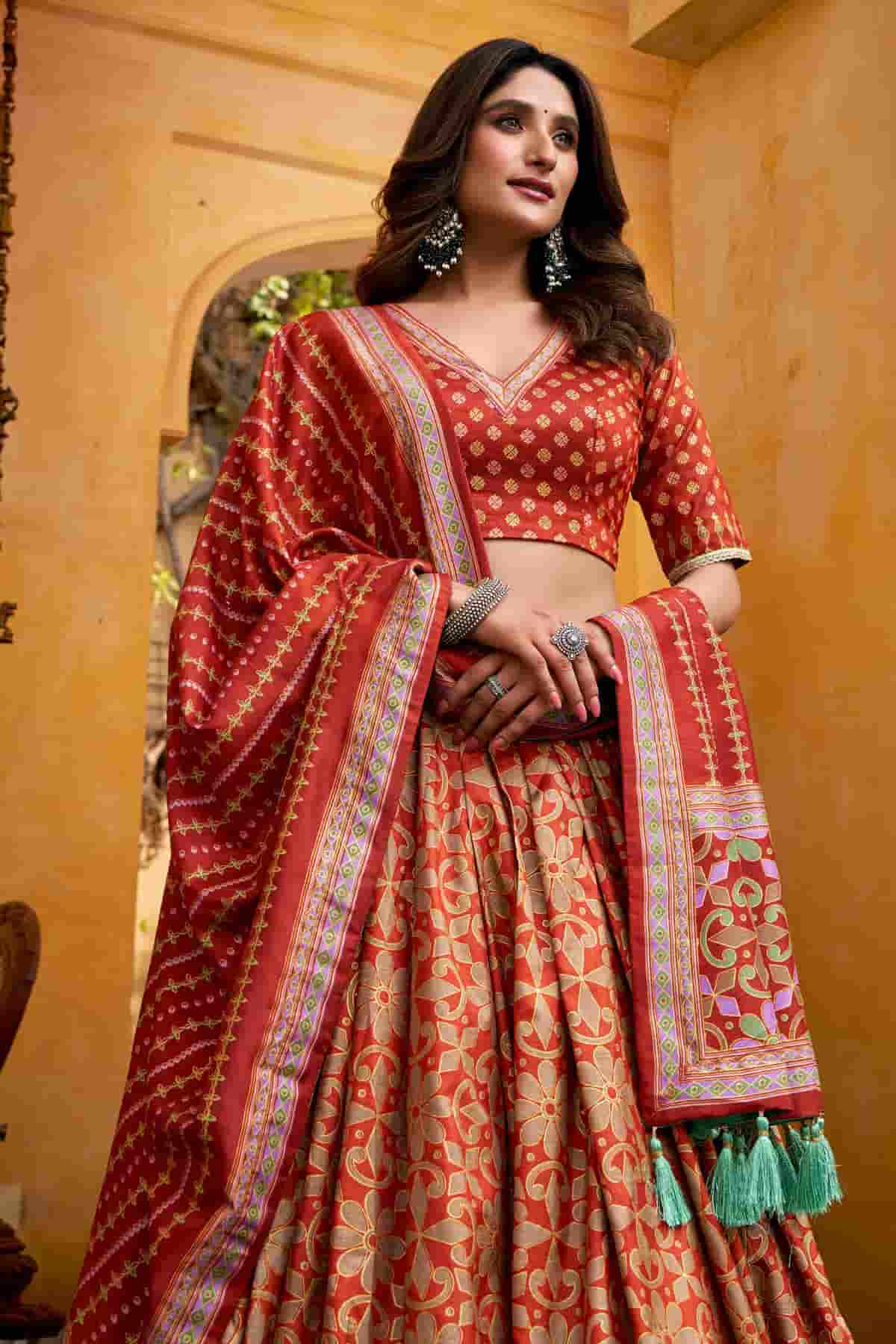 Tasar Silk Zari Woven Work Lehenga Choli In Orange Colour