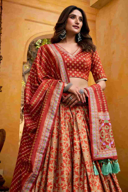 Tasar Silk Zari Woven Work Lehenga Choli In Orange Colour