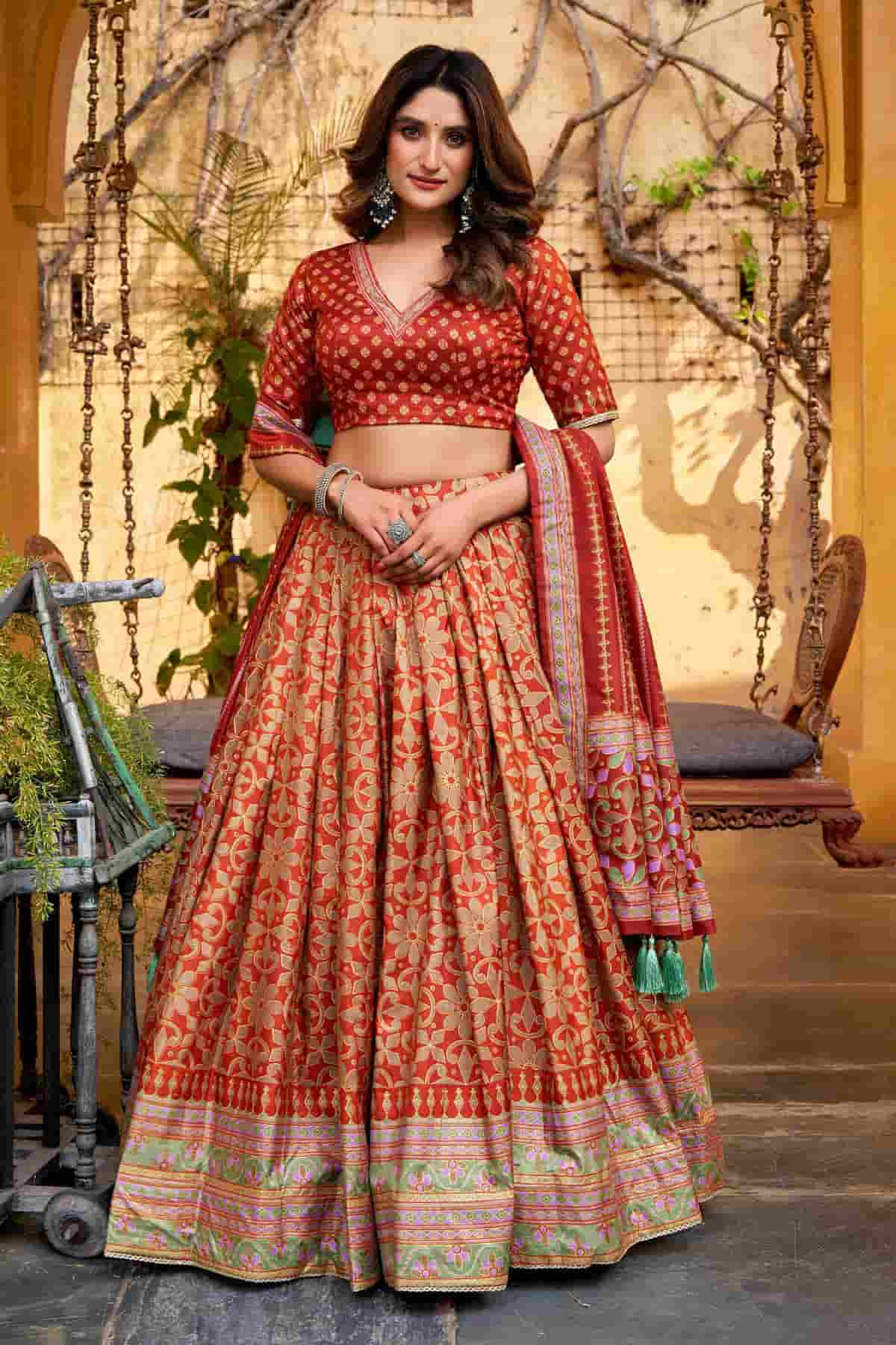 Tasar Silk Zari Woven Work Lehenga Choli In Orange Colour