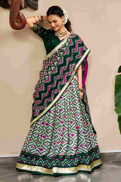 Tasar Silk Zari Woven Work Stitched Lehenga Choli In Green Colour