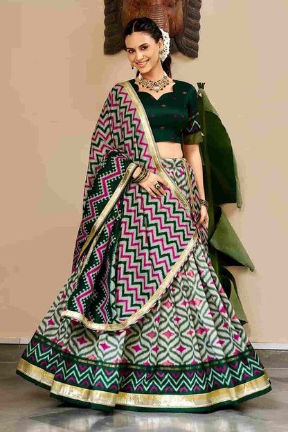 Tasar Silk Zari Woven Work Stitched Lehenga Choli In Green Colour
