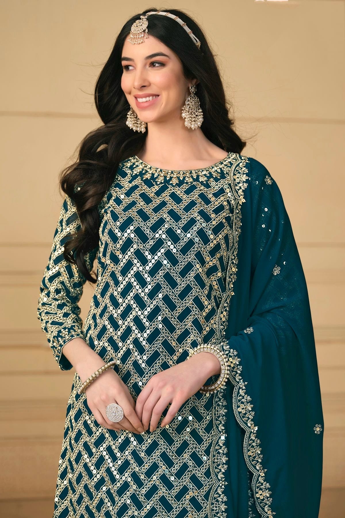 Teal Colour Semi Stitched Faux Georgette Sharara Suit SM1050475 A