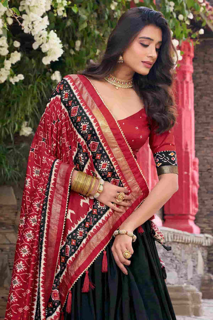 Tussar Silk Zari Woven Work Lehenga Choli In Black Colour