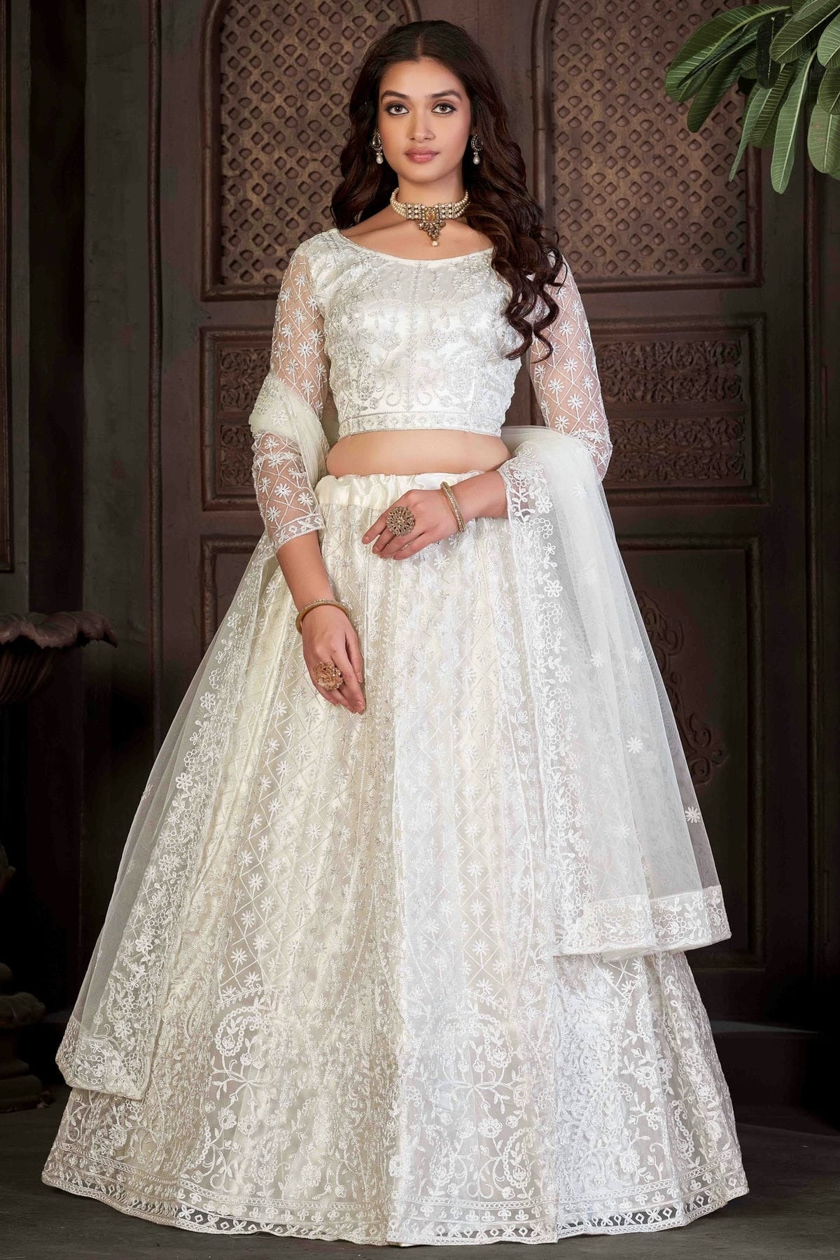 White Colour Net Semi Stitched Lehenga Choli LC1170058